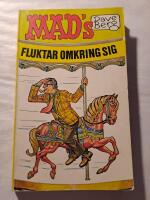 Mad's Dave Berg fluktar omkring sig