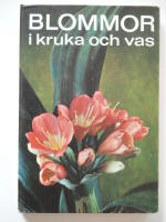 Blommor i kruka och vas
