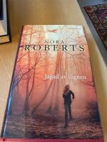 Jagad av l&ouml;gnen : sp&auml;nningsroman