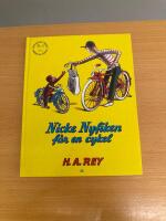 Nicke Nyfiken f&aring;r en cykel