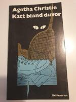 Katt bland duvor