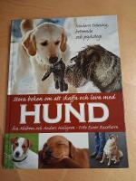 Stora boken om att skaffa och leva med hund : modern tr&auml;ning, beteende och psykologi