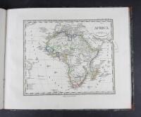 Skol-Atlas &ouml;fver alla verldens delar enligt dess nuvarande tillst&aring;nd, samt &ouml;fver verldsbyggnaden af Stieler i f&ouml;rminskad skala efter dess st&ouml;rre Hand-Atlas