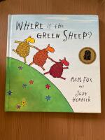 Where is the green sheep? 