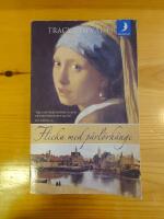 Flicka med p&auml;rl&ouml;rh&auml;nge