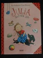 Julia s&auml;tter sig
