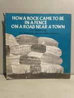 How a Rock Came to Be in a Fence on a Road Near a Town