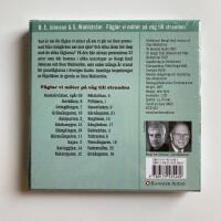 F&aring;glar vi m&ouml;ter p&aring; v&auml;g mot stranden (o&ouml;ppnad)