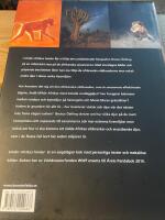 Under Afrikas himlar : M&ouml;ten med vildhundar och andra djur p&aring; savanner