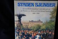 Staden sjunger.  En Stockholmskavalkad i ord, bild och ton 1860-1909.