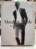 Manligt Mode - En ok&auml;nd historia