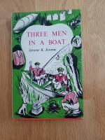 Three men in a boat