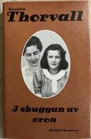 I skuggan av oron : [roman]