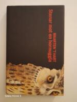 Stenar mot en hornuggla