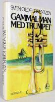 Gammal man med trumpet
