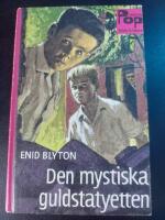 Den mystiska guldstatyetten