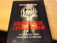 Sibirisk uppfostran : om kriminell heder, klankrig & tatueringar