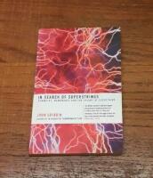 In Search of Superstrings: Symmetry, Membranes and the Theory of Everything