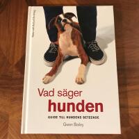 Vad s&auml;ger hunden : guide till hundens beteende