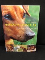 Hundens f&ouml;rsta &aring;r : fr&aring;n valp till unghund