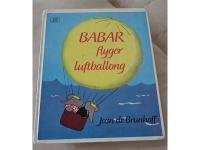 Babar flyger luftballong