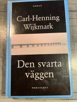 Den svarta v&auml;ggen : Roman