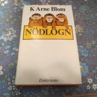 N&ouml;dl&ouml;gn : en roman om skuld