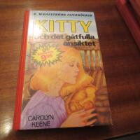 Kitty och det g&aring;tfulla ansiktet