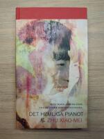 Det hemliga pianot : fr&aring;n Maos arbetsl&auml;ger till de stora konsertscenerna