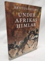 Under Afrikas himlar : M&ouml;ten med vildhundar och andra djur p&aring; savanner
