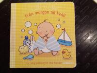 Fr&aring;n morgon till kv&auml;ll : en rolig pekbok f&ouml;r sm&aring; h&auml;nder