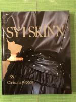Sy i skinn