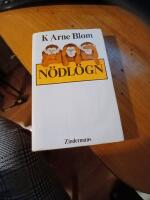  N&ouml;dl&ouml;gn : en roman om skuld