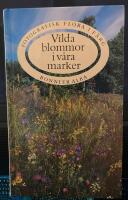 Vilda blommor i v&aring;ra marker : fotografisk flora i f&auml;rg