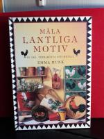 M&aring;la lantliga motiv p&aring; tr&auml;, terrakotta och metall