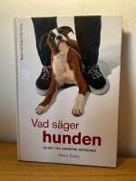 Vad s&auml;ger hunden : guide till hundens beteende