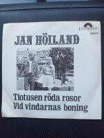Tiotusen r&ouml;da rosor / Vid vindarnas boning