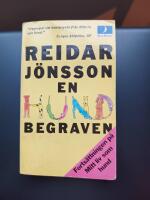 En hund begraven : roman