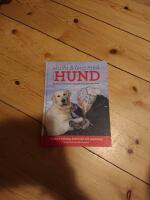 Stora boken om att skaffa och leva med hund : modern tr&auml;ning, beteende och psykologi