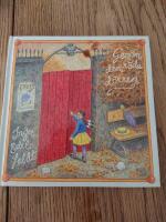 Genom den r&ouml;da d&ouml;rren eller Sagan om den lilla flickan, Gr&aring;tkungen och Lejonpojken