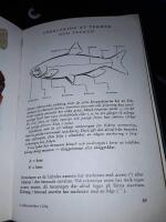 Akvariefiskar i f&auml;rg / f&auml;rgillustr. av N. Norvil.