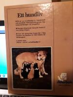 Ett hundliv : ett &aring;r i en hundfamiljs liv / fotografier: Jane Burton och Kim Taylor ; text: Michael Allaby och Jane Burton