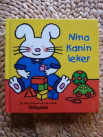 NINA KANIN LEKER : EN TITTA-BAKOM-LUCKOR-BOK