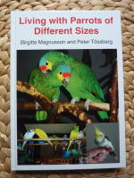 LIVING WITH PARROTS OF DIFFERENT SIZES