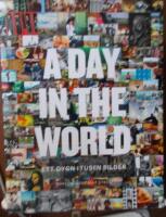 A day in the world : ett dygn i tusen bilder