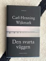 Den svarta v&auml;ggen : Roman