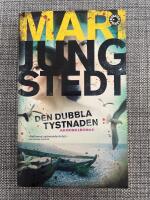 Den dubbla tystnaden