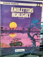 Spirous &auml;ventyr. Amulettens hemlighet
