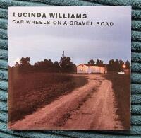 Car wheels on a gravel road