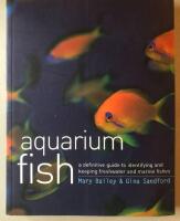 Aquarium fish : a definitive guide to identifying and keeping freshwater and marine fishes